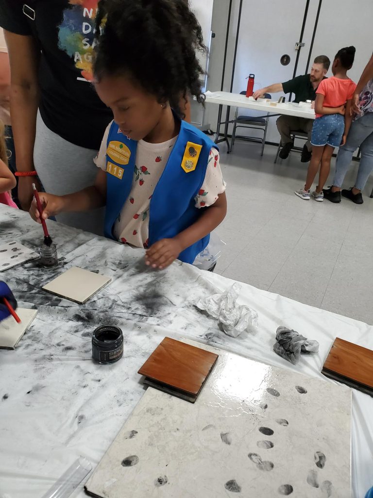 Girl Scouts Learn Earn STEM Badges with the help of Newport News Shipbuilding, Virginia Air and Space Center, and others at STEM Extravaganza